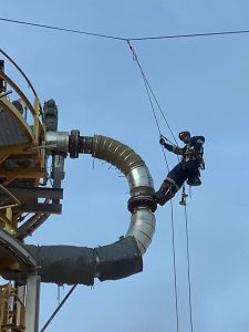 Man Using Rope Climbing To Access Heat Management Systems - MSCP Heat Management Solutions